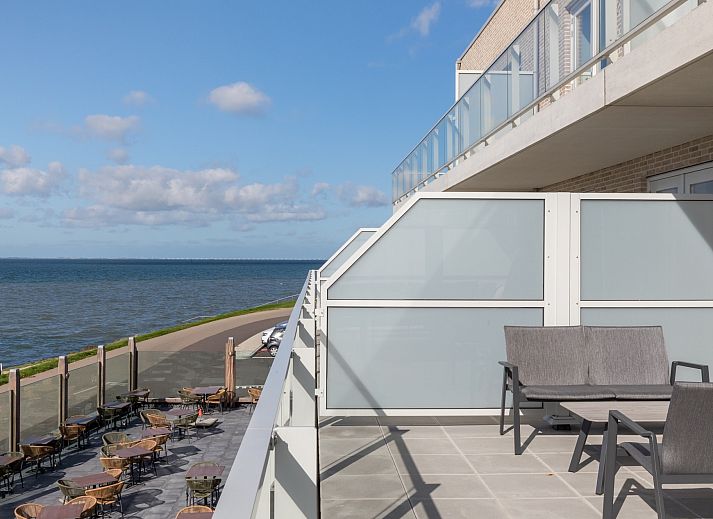 Appartement in Scherpenisse, gelegen in het pittoreske Tholen, Zeeland, biedt een prachtig uitzicht en moderne accommodatie aan de kust.