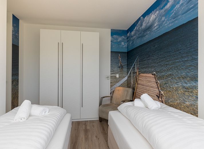 Appartement in Scherpenisse, gelegen in het pittoreske Tholen, Zeeland, biedt een prachtig uitzicht en moderne accommodatie aan de kust.