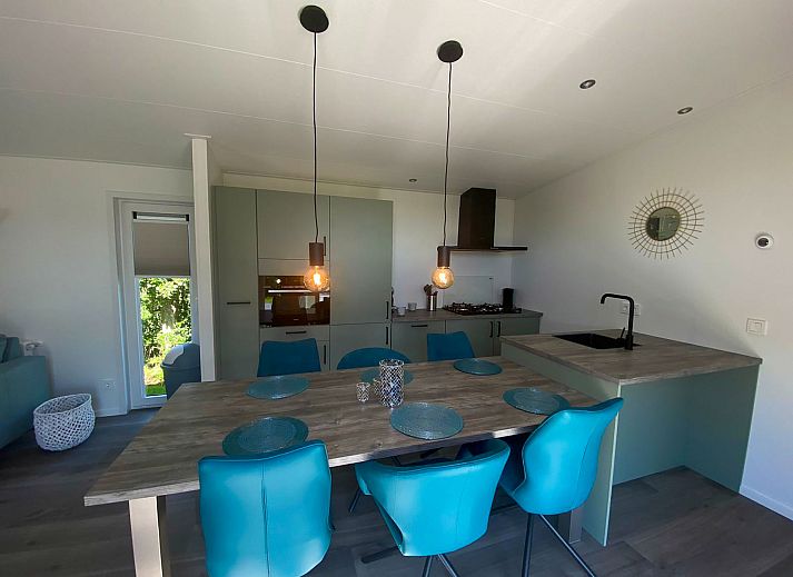 Cozy living room in Holiday home De Schelde in Scherpenisse, Tholen, Zeeland with modern furnishings.