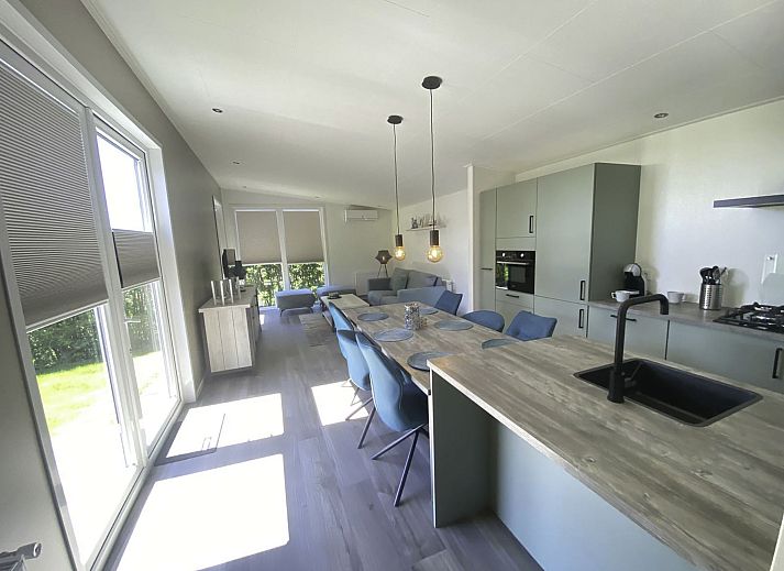 Cozy living room in Holiday home De Schelde in Scherpenisse, Tholen, Zeeland with modern furnishings.