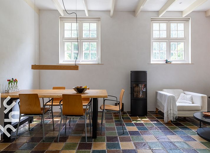 Cozy terrace at vacation home ZE1302 in Koudekerke, surrounded by green nature in Walcheren, Zeeland.