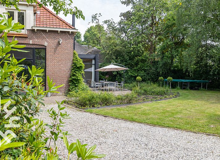 Attractive bedroom in vacation home ZE1302 in Koudekerke, Walcheren with wooden beamed ceiling.