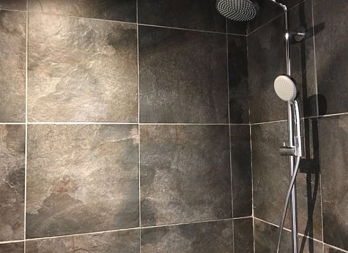 Gezellige woonkamer in Huisje in Koudekerke, vakantiehuis in Walcheren, Zeeland.