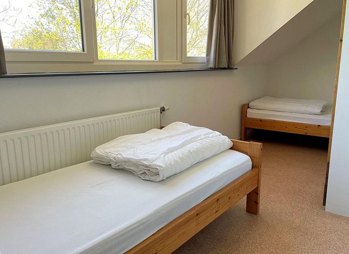 Bicycle storage at VZ034 Apartment Koudekerke, vacation home in Koudekerke, Walcheren, with covered space.