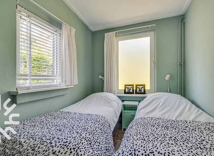 Gemuetliches Wohnzimmer des Ferienhauses ZE722 in Oostkapelle, Walcheren, Zeeland mit Kamin.