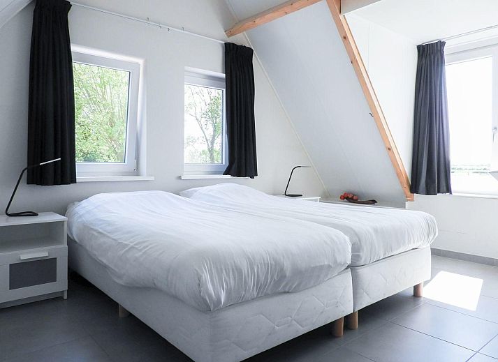 Terrasse des VZ488 Ferienhauses Oostkapelle mit Blick auf die Natur, Zeeland.