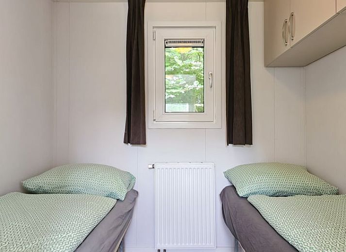 Comfortabele zithoek in Huisje in Oostkapelle, Walcheren, met uitzicht op de natuur.