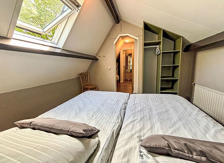 Uitzicht op het terras van Appartement Boszicht 6 in Oostkapelle, Walcheren, Zeeland.