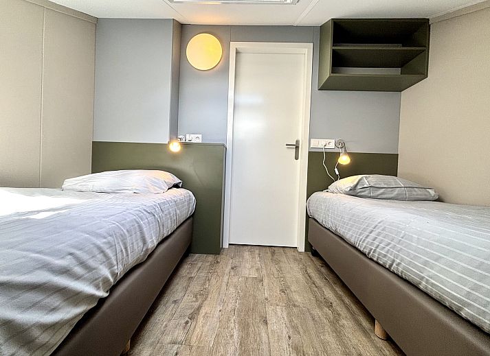 Uitzicht op het terras van Appartement Boszicht 6 in Oostkapelle, Walcheren, Zeeland.