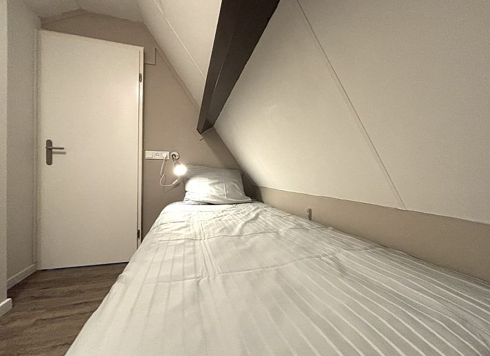 Uitzicht op het terras van Appartement Boszicht 6 in Oostkapelle, Walcheren, Zeeland.