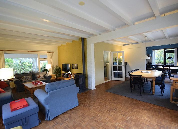 Backyard of VZ1157 Detached very spacious vacation home in Oostkapelle with terrace and green surroundings.