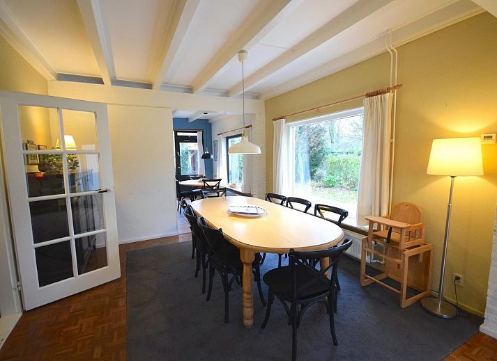 Backyard of VZ1157 Detached very spacious vacation home in Oostkapelle with terrace and green surroundings.