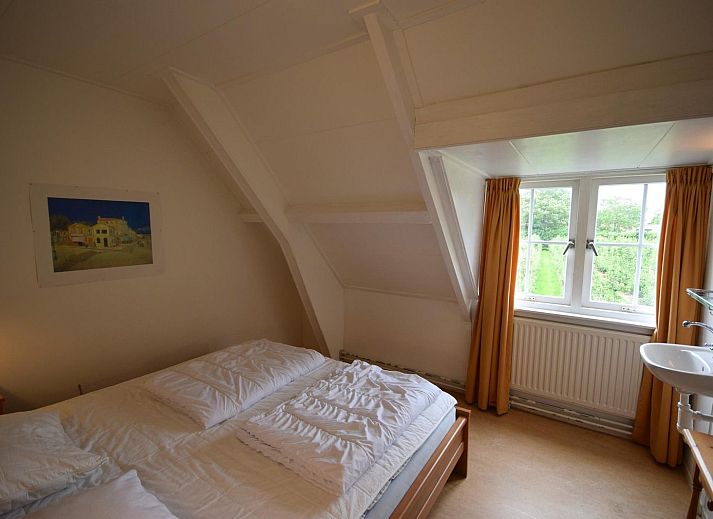 Gemuetliches Wohnzimmer in VZ2329 Ferienhaus Oostkapelle mit komfortabler Sitzecke, Walcheren.