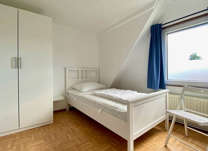 Vakantiewoning Oostkapelle met groene tuin en houten tuinhuis, gelegen in Oostkapelle, Walcheren, Zeeland, op 800 m van het strand.