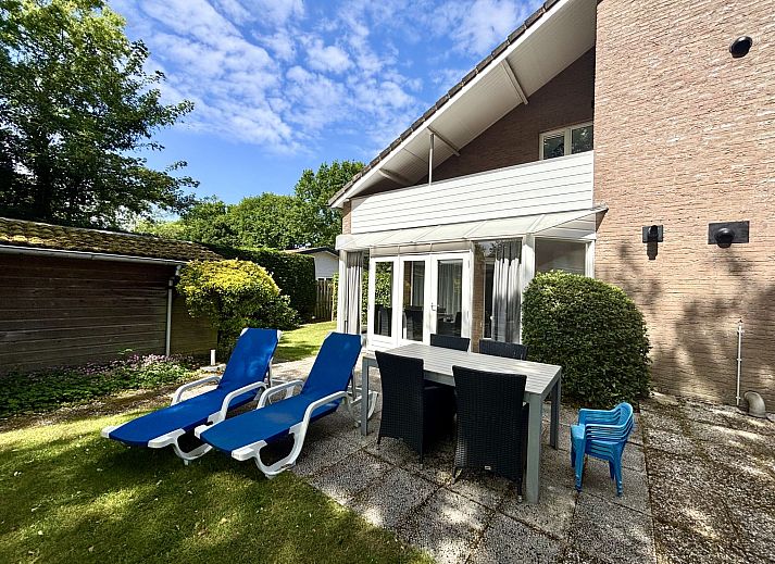 Relax in the garden of Apartment Boszicht 1, Oostkapelle, Walcheren, with deck chairs and privacy.