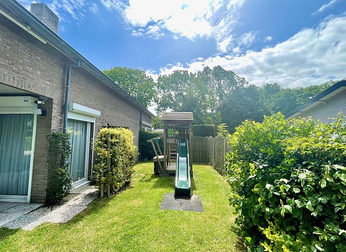 Relax in the garden of Apartment Boszicht 1, Oostkapelle, Walcheren, with deck chairs and privacy.