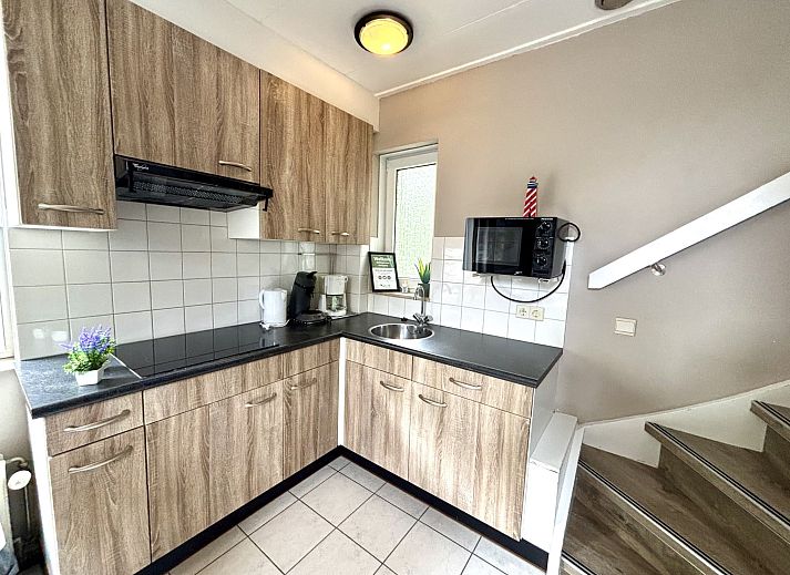 Comfortabele zithoek in Appartement Boszicht 3, Oostkapelle, Walcheren, Zeeland met moderne inrichting.