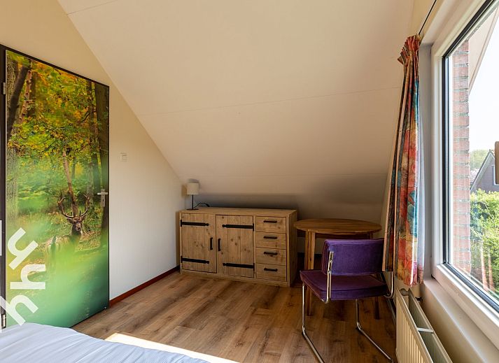 Cozy bedroom with two beds in vacation home ZE414, Oostkapelle, Walcheren, Zeeland.