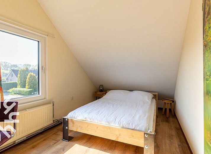 Comfortable bedroom with a double bed in ZE414, Oostkapelle, Walcheren, Zeeland.
