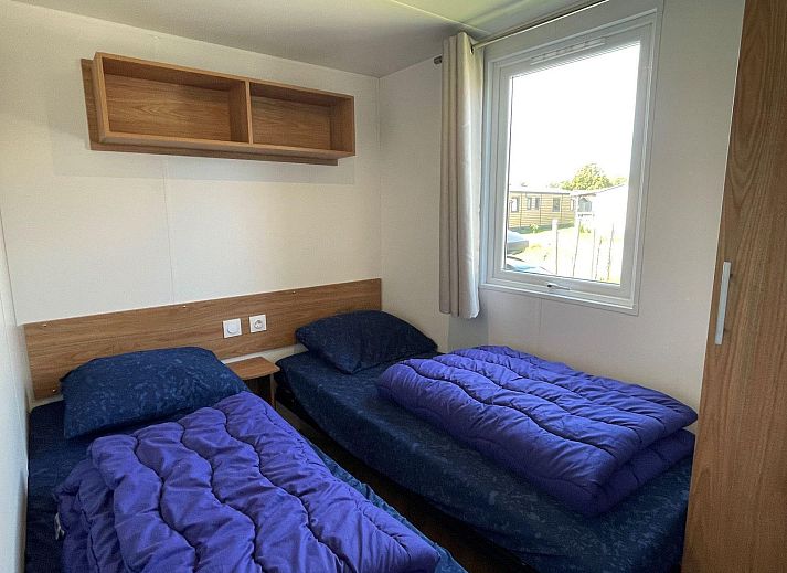 Overdekte loungehoek bij VZ2332 Vakantiechalet in Oostkapelle, Walcheren, Zeeland.