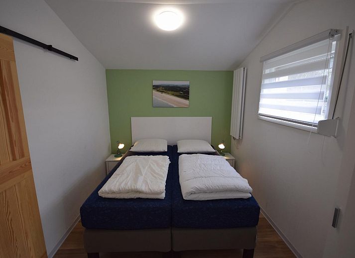 VZ1091 Vakantiehuis in Oostkapelle, gezellige voortuin met groen in Walcheren, Zeeland.