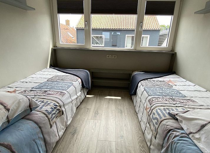 Helles Wohnzimmer in VZ831 Ferienhaus Oostkapelle, Walcheren, mit gemuetlicher Sitzecke.