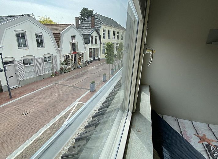 Helles Wohnzimmer in VZ831 Ferienhaus Oostkapelle, Walcheren, mit gemuetlicher Sitzecke.