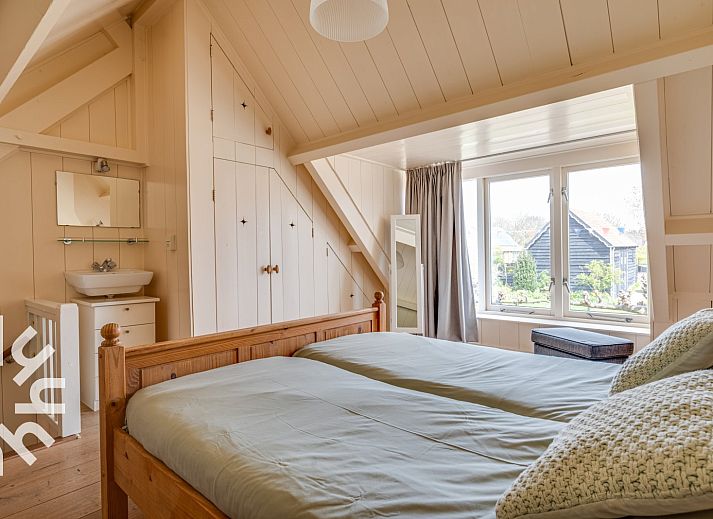 Ruhige Sitzecke im Garten des Ferienhauses ZE049, Oostkapelle, Walcheren, Zeeland.