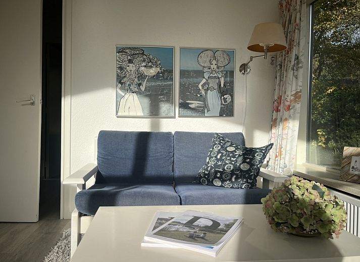 Vakantiehuis ZE1678 in Oostkapelle, Walcheren, met zonnig terras en groene tuin, ideaal voor ontspanning in de natuur van Zeeland.