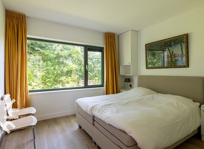 Ruime woonkamer van vakantiehuis ZE263 in Westkapelle met moderne inrichting.