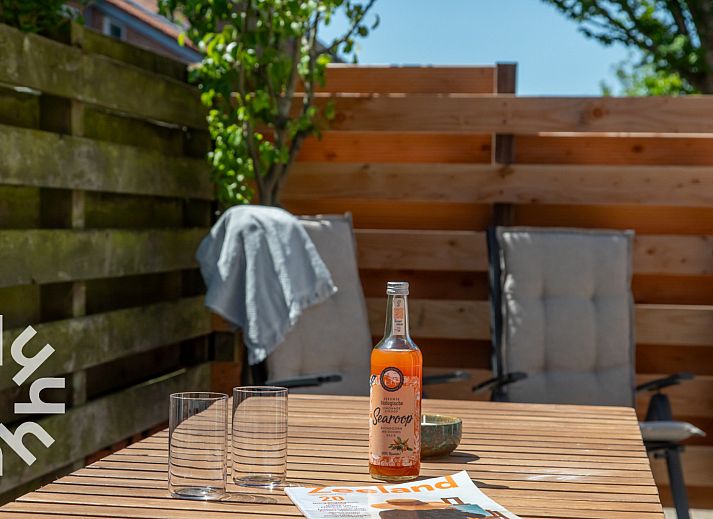 Dining area with terrace view in vacation home ZE1508, Westkapelle, Walcheren, Zeeland.