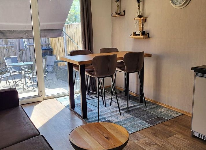 Modern living room of VZ2343 Holiday cottage Westkapelle with comfortable sofa in Walcheren.