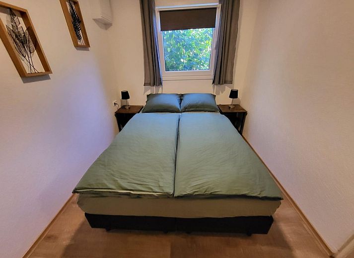 Dining area in VZ2343 Holiday home Westkapelle, perfect for cozy meals in Zeeland.