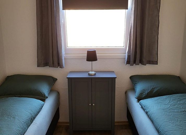 Dining area in VZ2343 Holiday home Westkapelle, perfect for cozy meals in Zeeland.