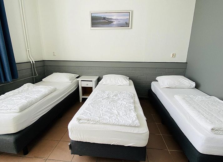 Side view of VZ131 Group accommodation Westkapelle, vacation home surrounded by greenery in Walcheren.