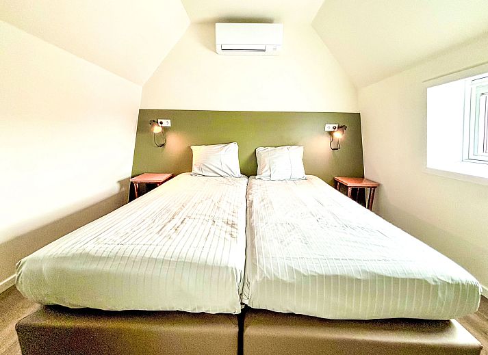 Gemuetliches Esszimmer im Ferienhaus Beach House Westkapelle 103 C, Westkapelle, Walcheren, Zeeland.