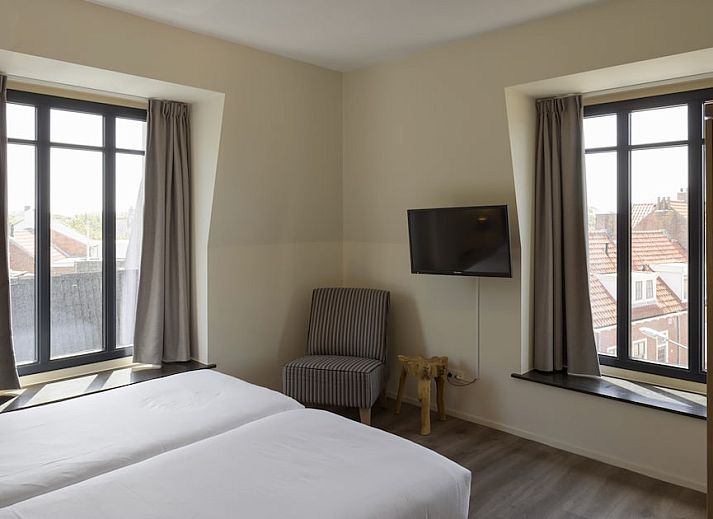 Comfortabele zitruimte in Bordeaux 4 appartement in Domburg, Walcheren, Zeeland met gezellige sfeer.