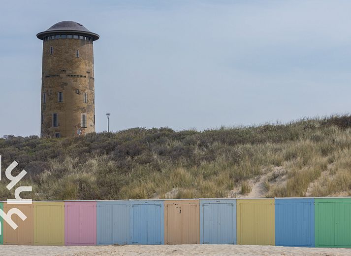 Gezellige woonkamer van vakantiehuis ZE1489 in Domburg, Walcheren, met toegang tot het zonnige terras.