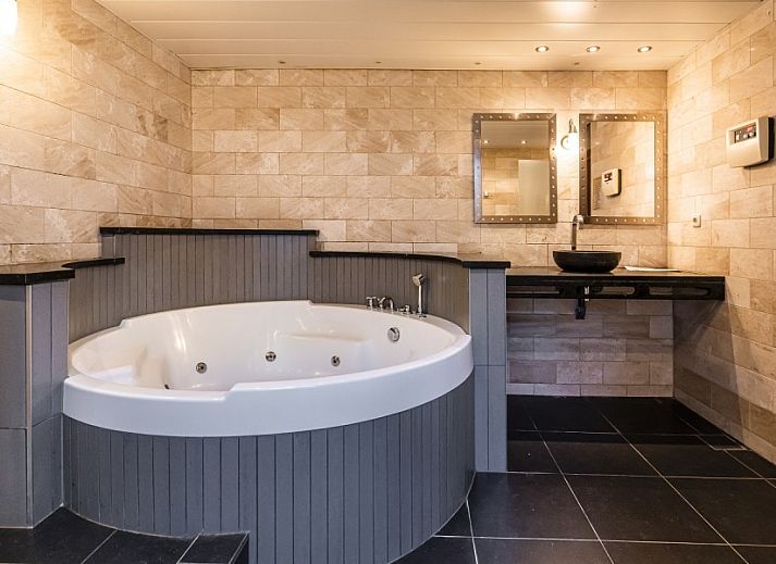 Gezellige zithoek in Westduin 19 vakantiehuis, Vlissingen, Walcheren, met moderne inrichting.