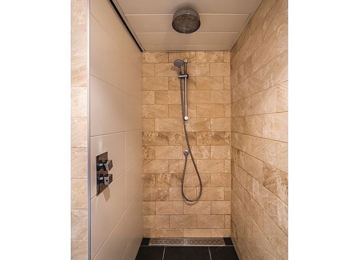 Gezellige zithoek in Westduin 19 vakantiehuis, Vlissingen, Walcheren, met moderne inrichting.