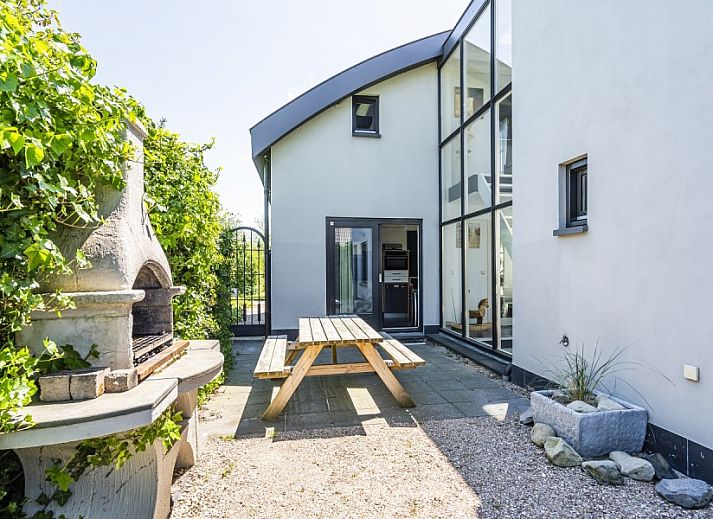 Open keuken en eetruimte in Westduin 19 vakantiehuis, Vlissingen, Walcheren, ideaal voor familiediners.