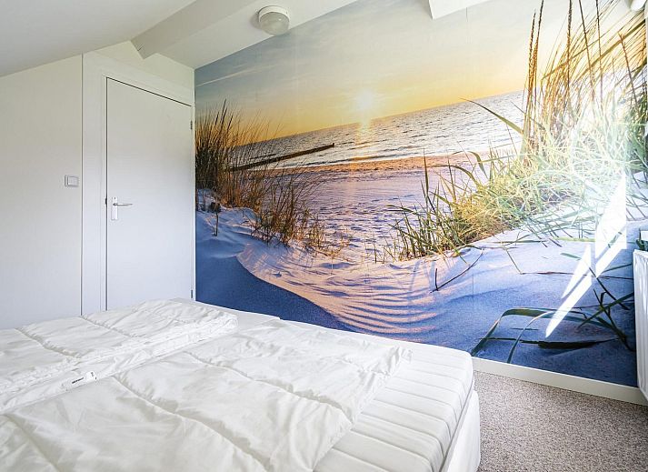 Buitenzijde van VZ1098 Vrijstaand vakantiehuis in Vlissingen, Walcheren, omringd door groen.