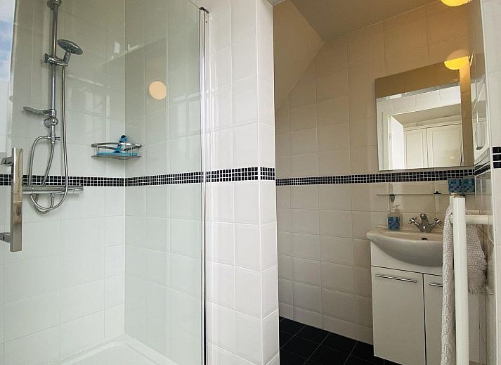 Gezellige woonkamer van VZ733 Studio Vlissingen, vakantiewoning in Vlissingen, met uitzicht op de zee.