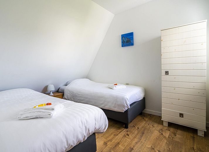 Aussenbereich des VZ1143 Ferienhauses in Vlissingen mit Gartenmoebeln in Zeeland.