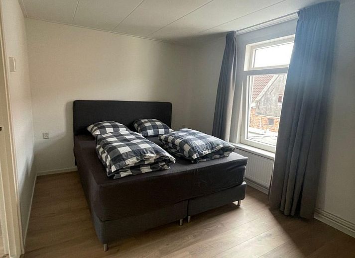 Gezellige woonkamer van VZ2419 Vakantiewoning Vlissingen met moderne inrichting in Zeeland.