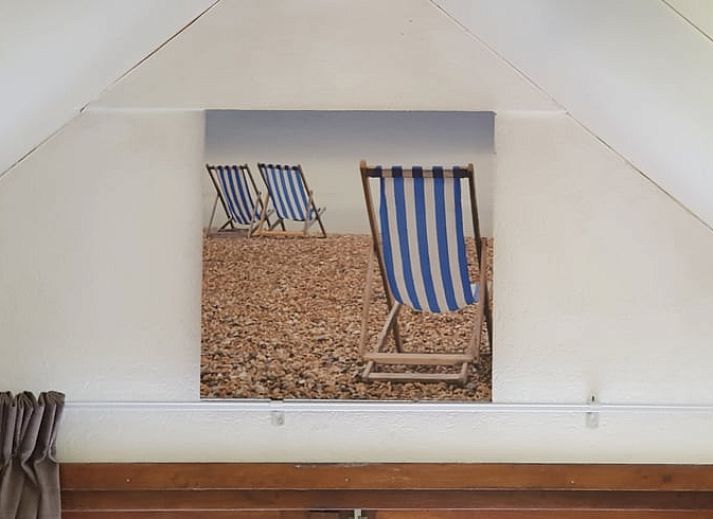Gezellige veranda bij Vakantiehuisje in Vlissingen, ideaal voor ontspannen avonden in Walcheren, Zeeland.
