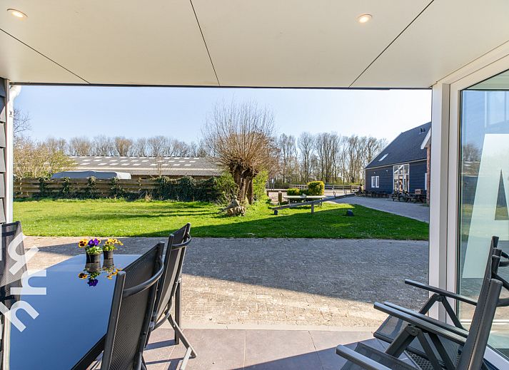 Gezellige woonkamer in vakantiehuis ZE1445, Aagtekerke, Walcheren met comfortabele zithoek.