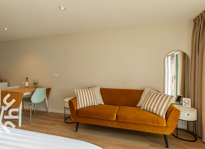 Buitenkant van vakantiehuis ZE1487 in Aagtekerke, Walcheren met charmante bakstenen gevel.