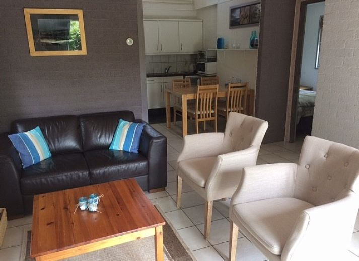 De Zandput 22 vakantiehuis met zonnig terras in Zoutelande, Walcheren, omgeven door groene natuur voor een ontspannen verblijf.