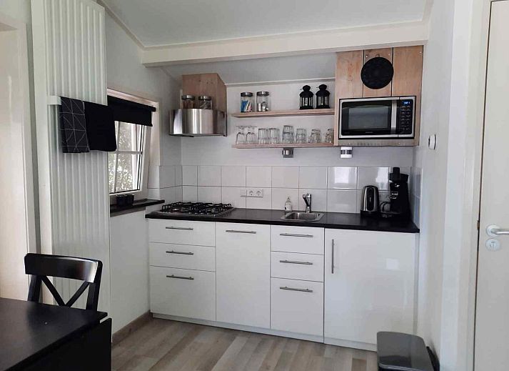 Charmantes Ferienhaus ZE267 in Zoutelande mit einladender Terrasse und gruener Umgebung in Walcheren, Zeeland.